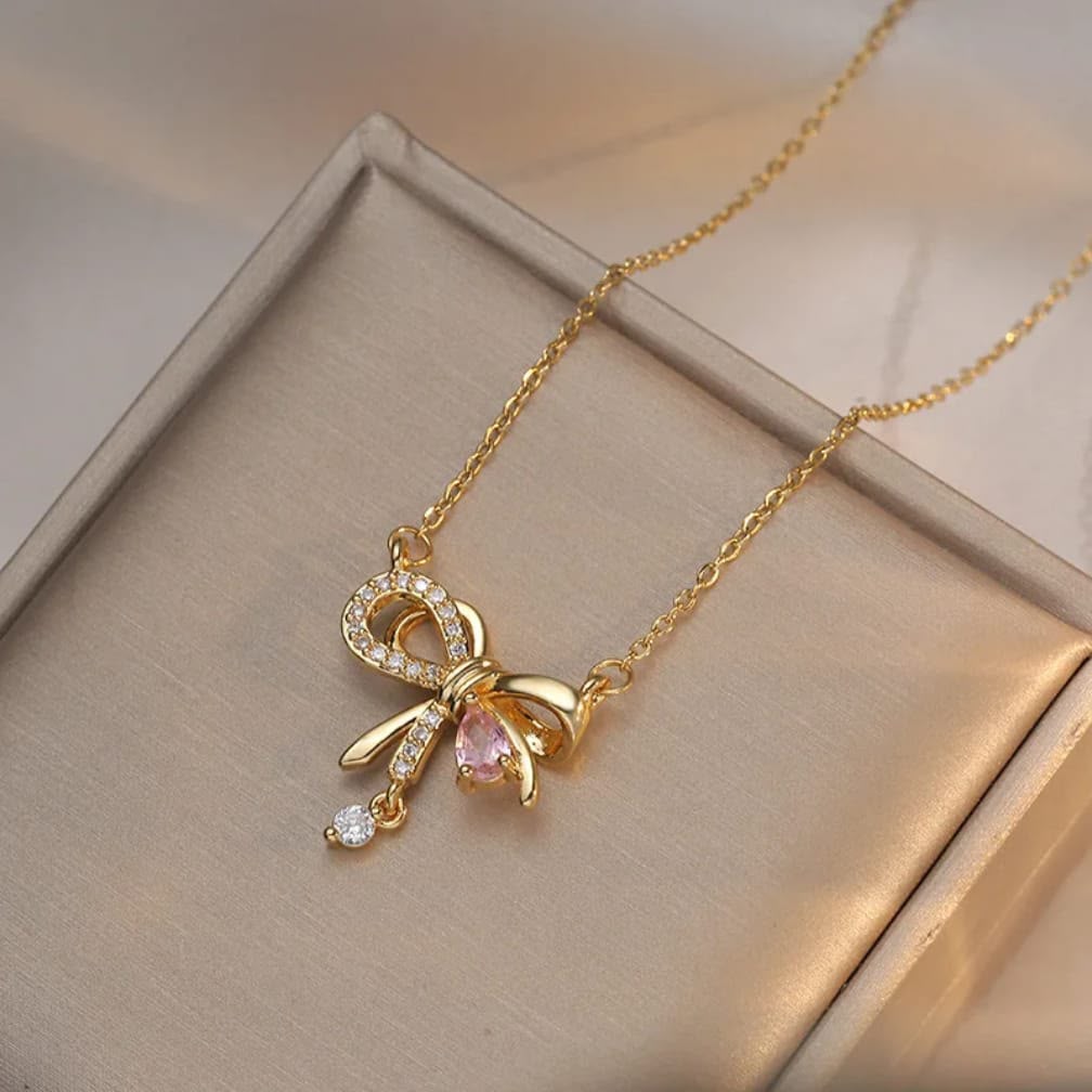 Infinity Bow Pendant Necklace – Gold & Silver |Collection AAS